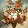 Vase d'orfèvrerie garni de fleurs